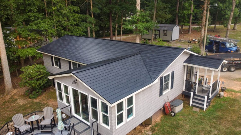 gray home with black GAF timbersteel roof