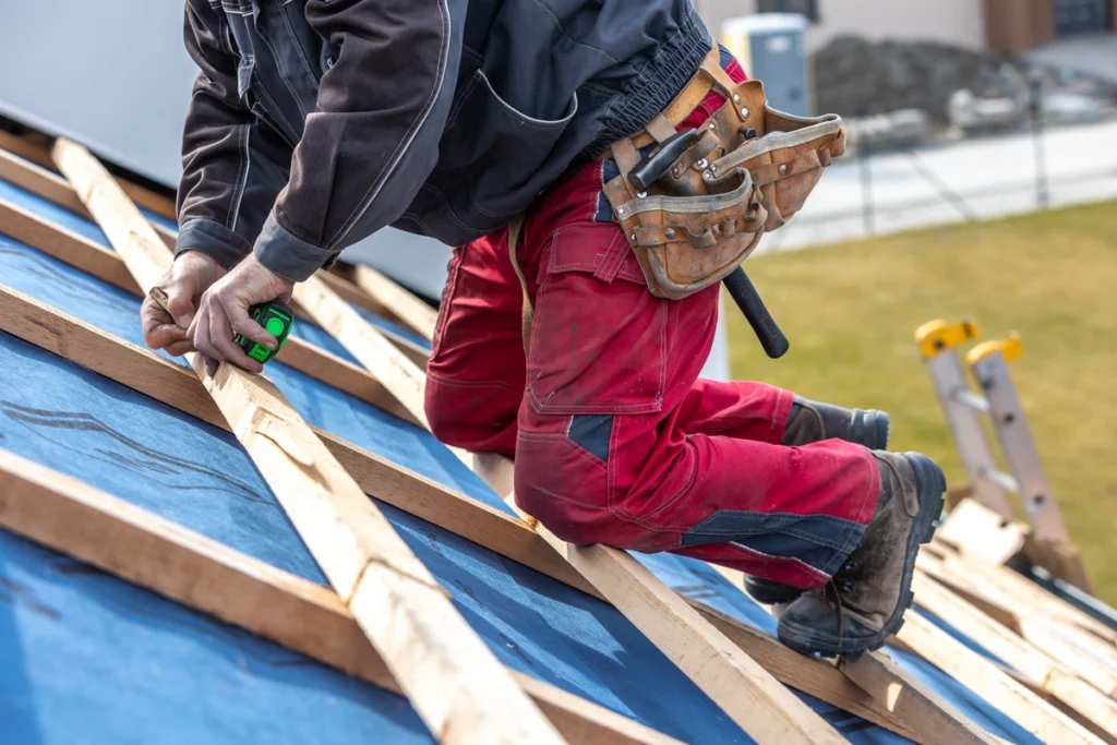 close up to worker building new roof