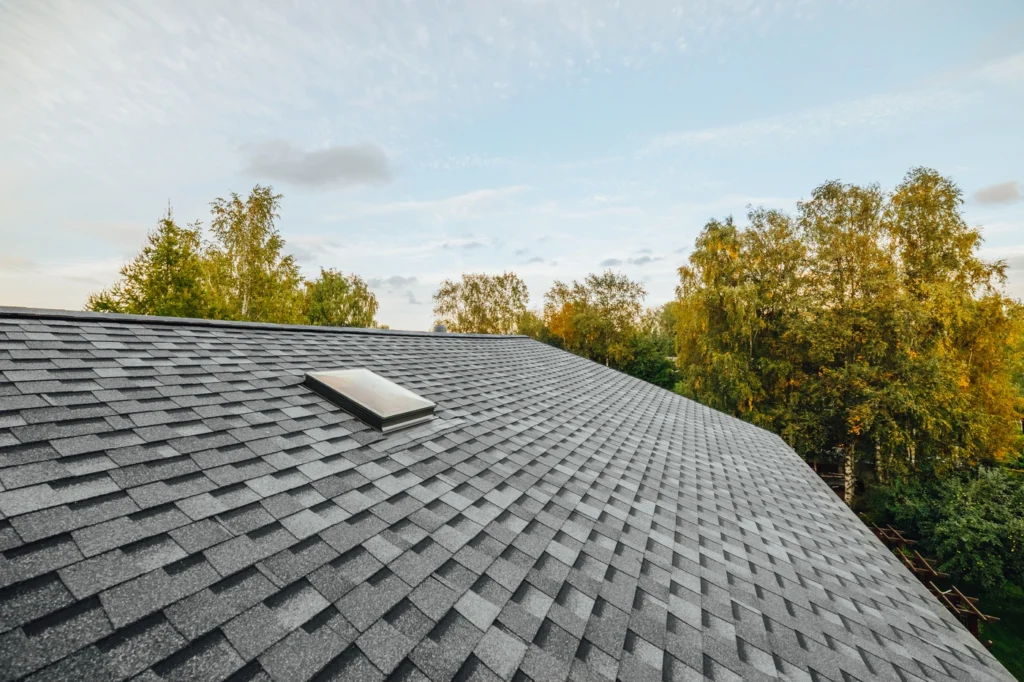 close up of new shingle roof installation with gaf grey shingles colors