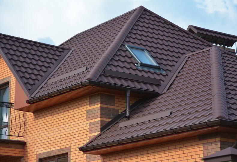 roofing emporia va-brick house with dark brown metal shingles