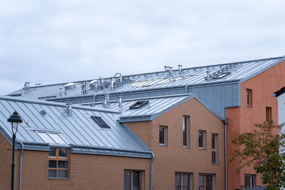 commercial roofing boydton va-street view of brick commercial building with metal roofing materials