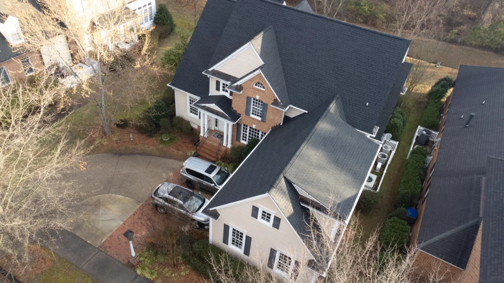 aerial view of dark shingle roofing system in macon nc