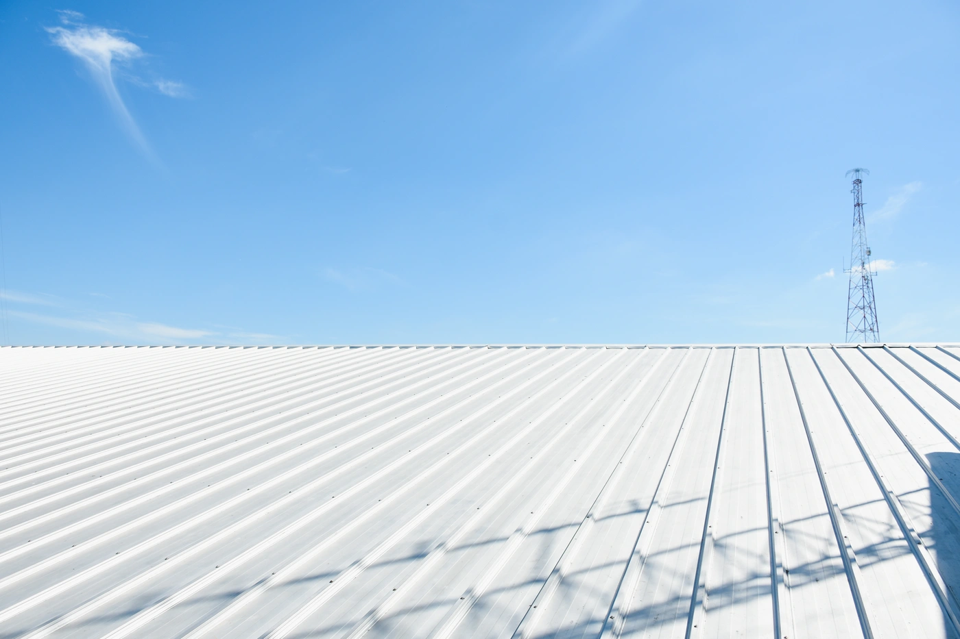 close up of white metal roof installation on midlothian business