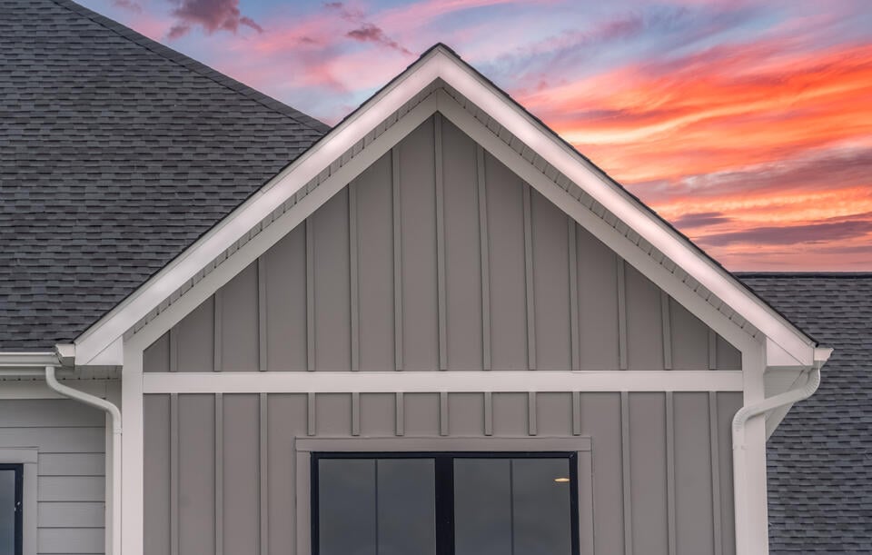 rake board vs fascia-rake board near gabled end of house roof