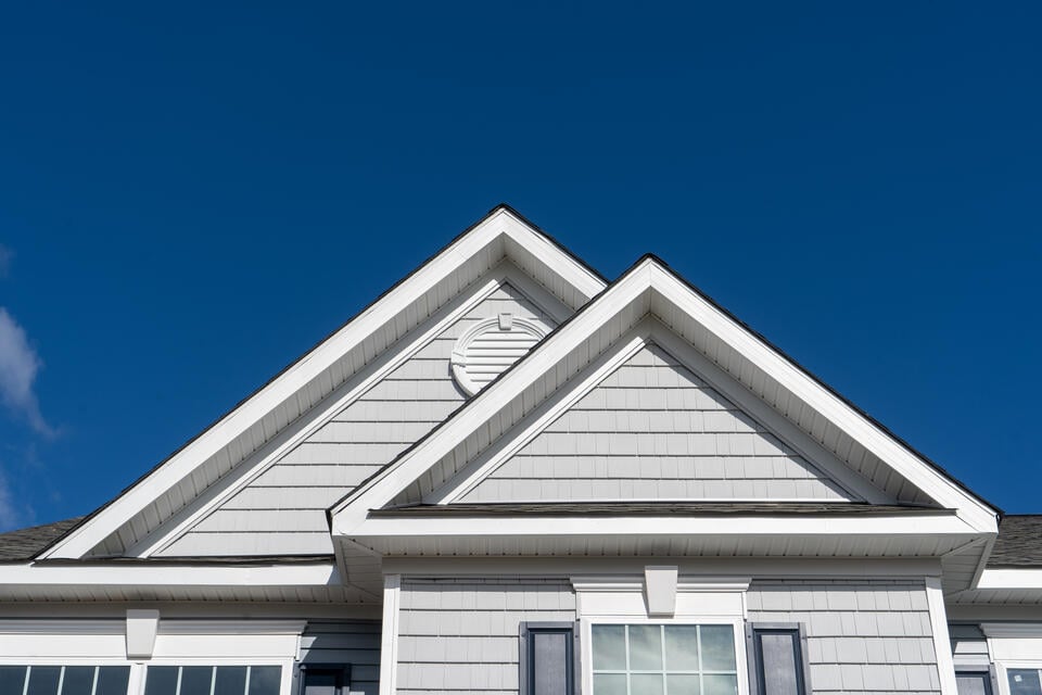 rake board vs fascia-white sided house with white rake board and fascia