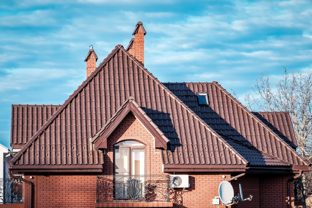 red metal roof brick siding