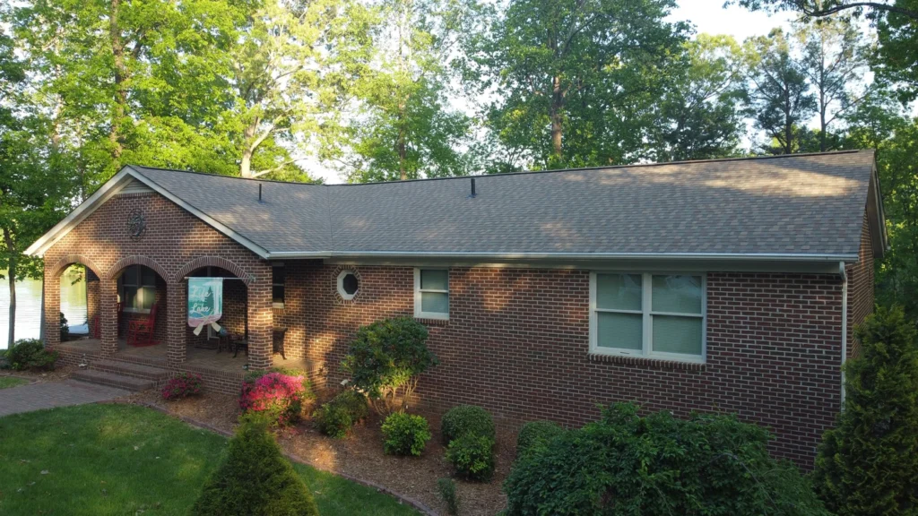 quaint brick richmond home with new roof replacement using asphalt shingles