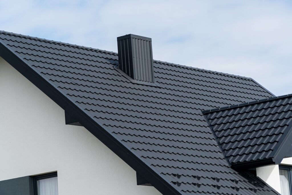 The house is covered with a modern metal roof