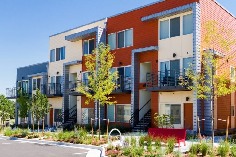 Modern arapartment complex painted in bright colors.