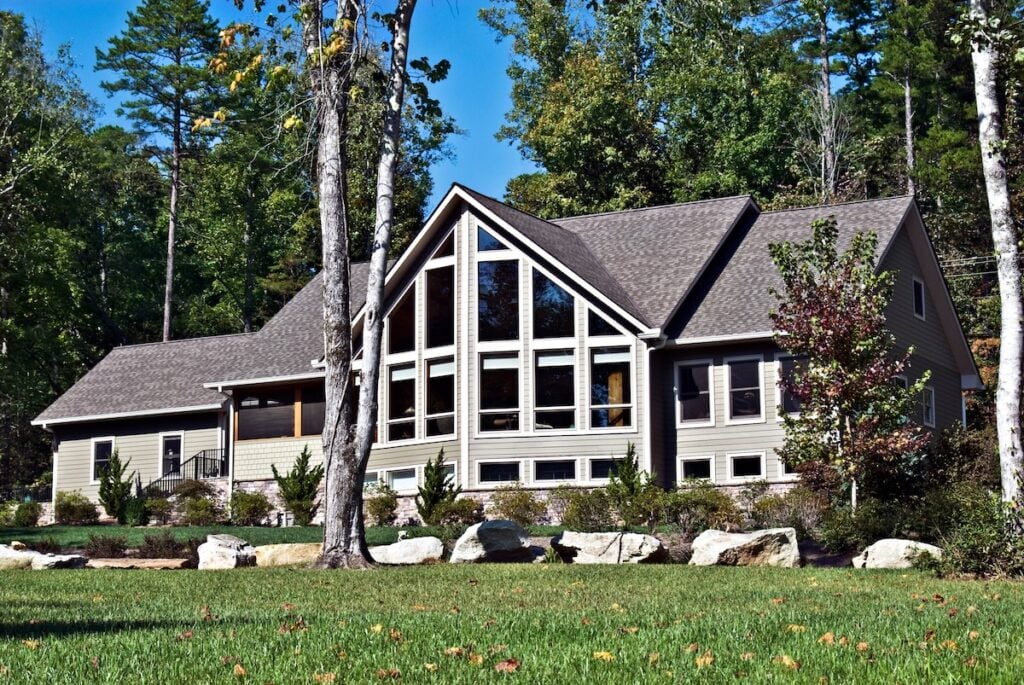 Large House with Windows and Rocks in the Landscape