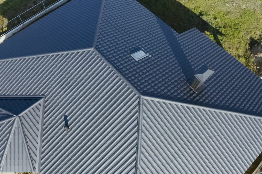 Modern roof made of metal. Corrugated metal roof and metal roofing.