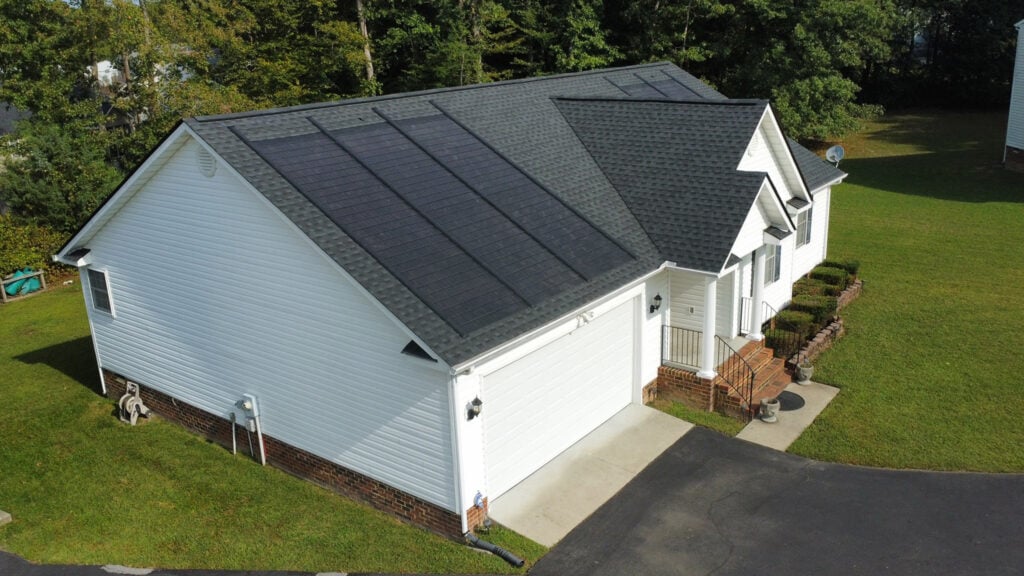 Aerial drone photo of GAF solar shingles on shingle roof