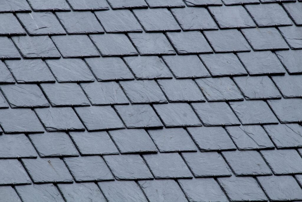 types of roof slates New slate roof, slate texture, perfect shape. Slating roof. Grey colors.