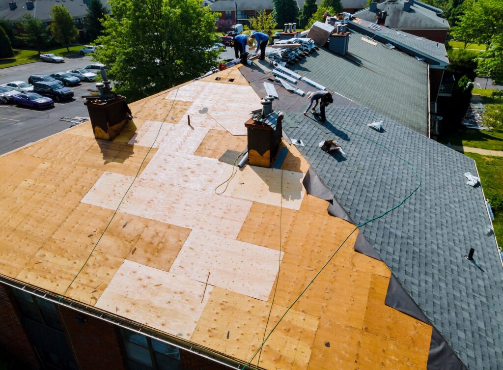 how to dispose of shingles Roof repairs old roof replacement with new shingles of an apartment building