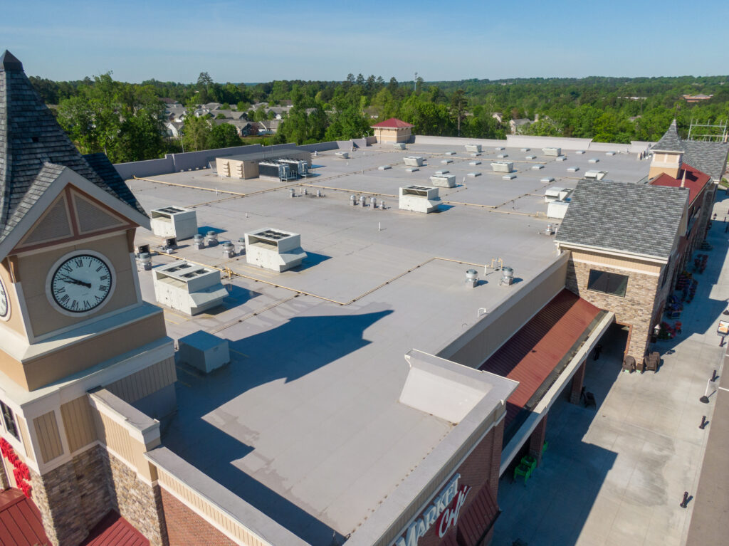 TPO Flat Commercial Roof With Metal Panels: New & Existing Construction