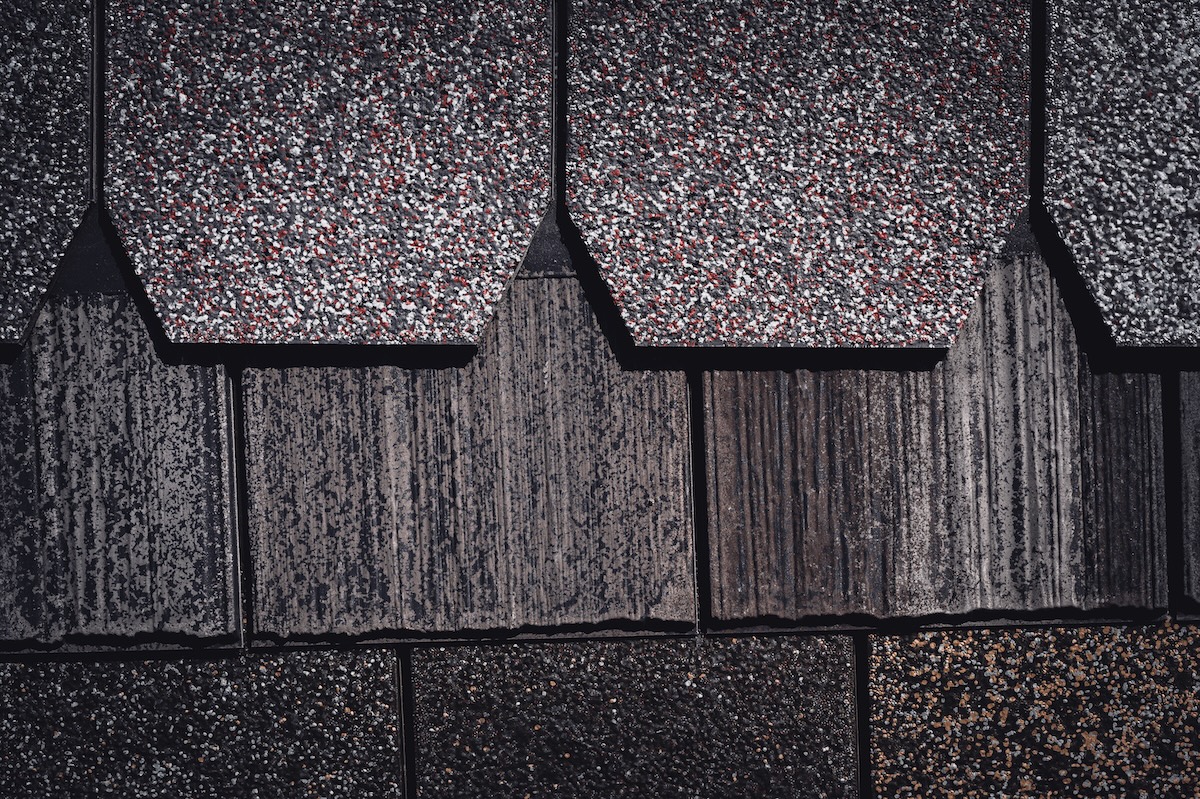 Assorted selection of synthetic roof shingles to pick a new style. High quality photo