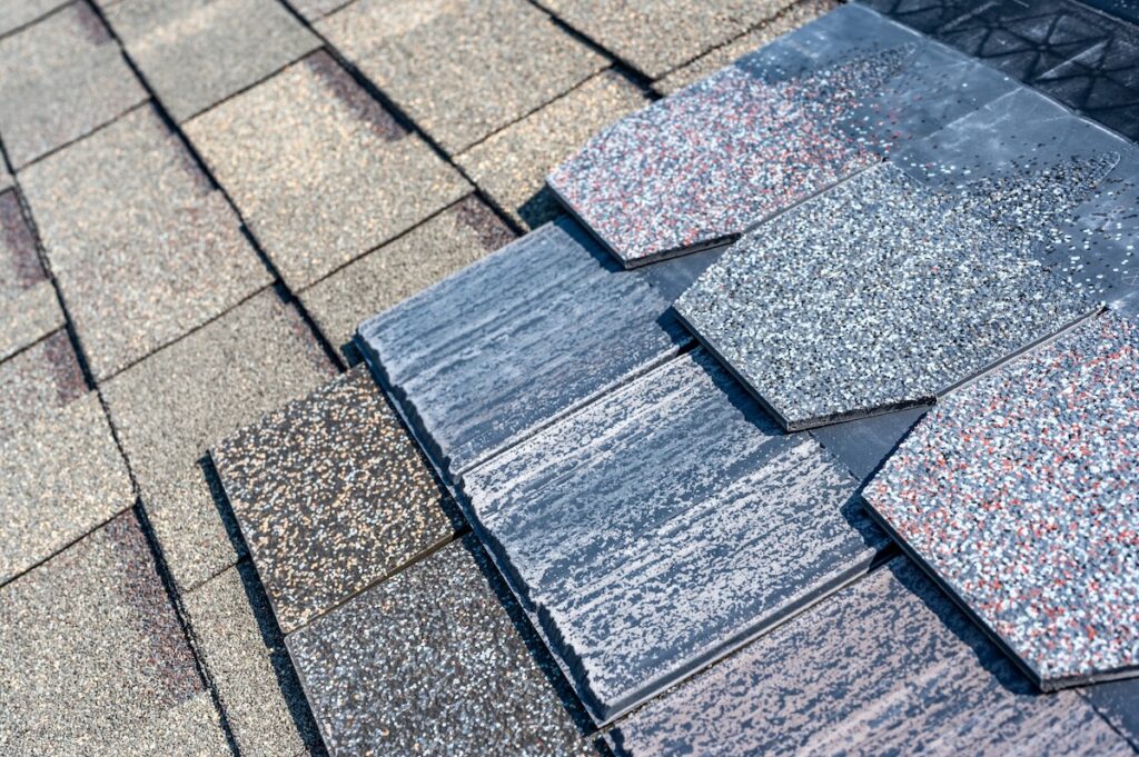Assorted selection of synthetic roof shingles to pick a new style. High quality photo